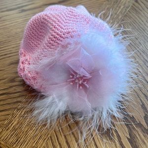 Pink Crochet baby hat with feathers